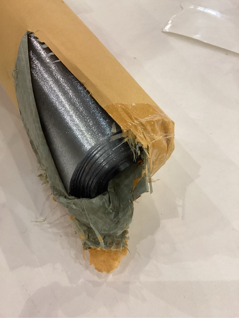 This is a roll of black glitter vinyl upholstery fabric.  