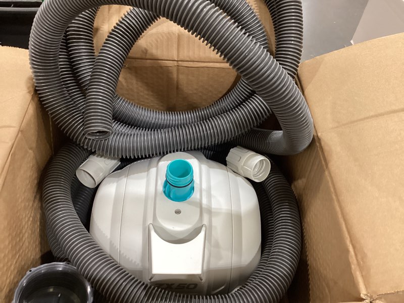 Condition photo showing As Is for intex 28007e zx50 suction-side above ground automatic vacuum pool cleaner: for smaller pools – cleans pool floor – removes debris – removable filter tray – 21ft tangle free hose 900-1500 gal/h pump flow rate required zx50 zx50