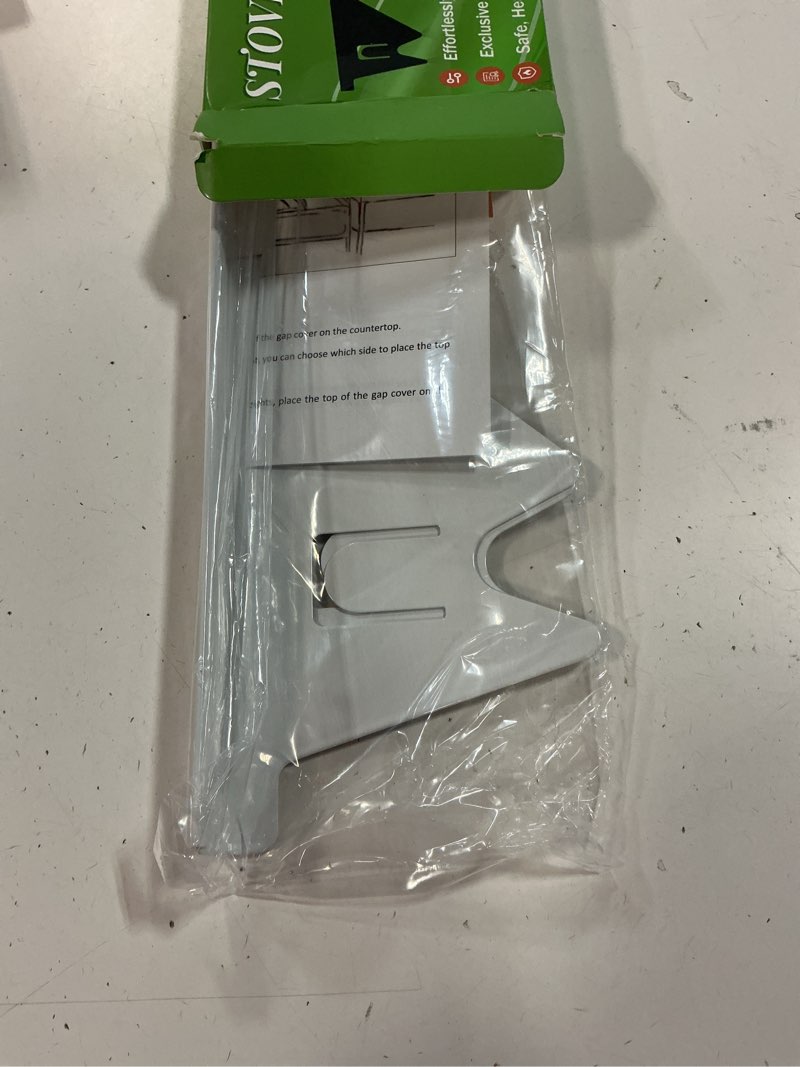 Condition photo showing Good Condition for Stove Gap Covers Stainless Steel, 2 Pack Stove Gap Filler Easy Retractable Length 13.8" to 27.5", Width 0.79" ALMCALS Stove Gap Guards Range Trim Kit, Heat Resistant Guard Between Stove Top & Counter White