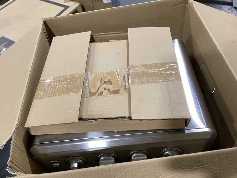 Condition photo showing Good Condition for Cuisinart Air Fryer Toaster Oven, 1800W, 8-in-1 with Air Fry, Convection, Broil & Warm, 0.6 Cubic Feet, 60-Minute Timer, TOA-70NAS, Stainless Steel Stainless Steel Convection Toaster Air Fryer Oven w/ Grill