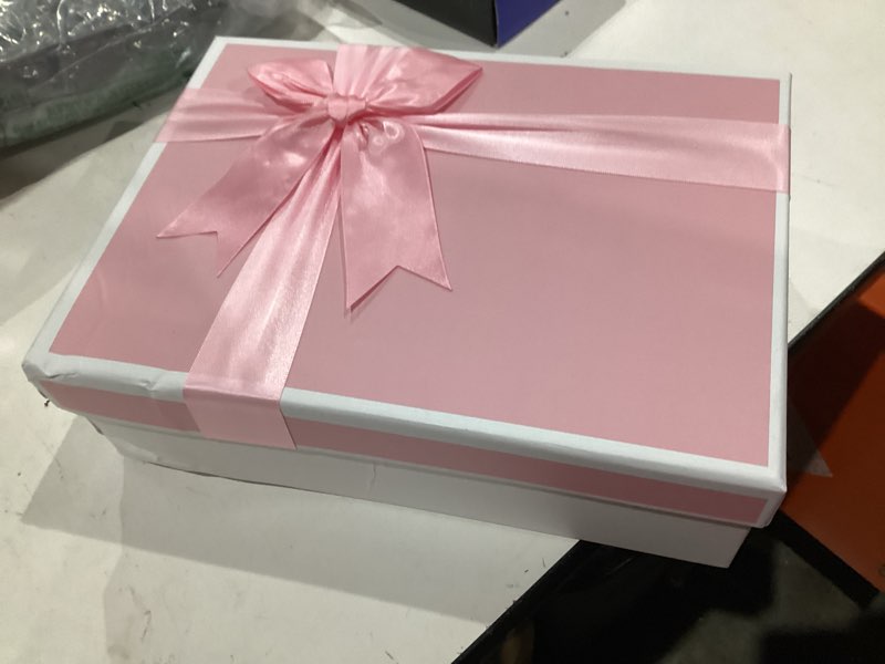 Condition photo showing As Is for giftilious pink gift boxes with lids for presents, set of 3 gift wrap boxes with ribbon, assorted boxes for gifts, sturdy & pre-wrapped gift box