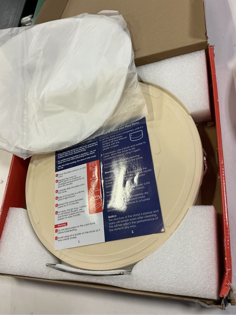 Condition photo showing As Is for kitchenstar 14-inch pizza stone for oven and bbq grill with handles, round, 5/8" thick - natural cordierite, 1800 °f resistant, baking stone set with stainless steel rack & plastic scraper tool 14 inch