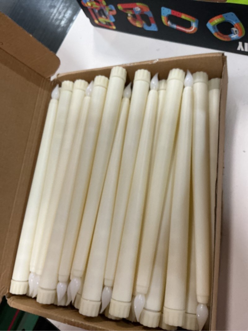 Condition photo showing Good Condition for Treela 36 Pieces Flameless Taper Candles 11 Inch Flickering Faux LED Battery Operated Electric Fake Candles for Christmas Halloween Birthday Wedding Party Supplies(Ivory) Ivory Smooth