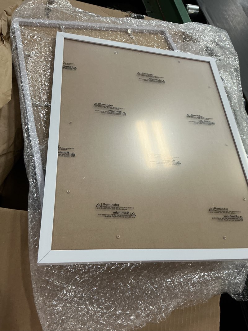 Condition photo showing As Is for upsimples 12x16 Picture Frame White 3 Pack, Scratch-Proof Poster Frames 12 x 16 for Photo Gallery - Slide-In Strips, Horizontal or Vertical Wall Mounting White 12x16