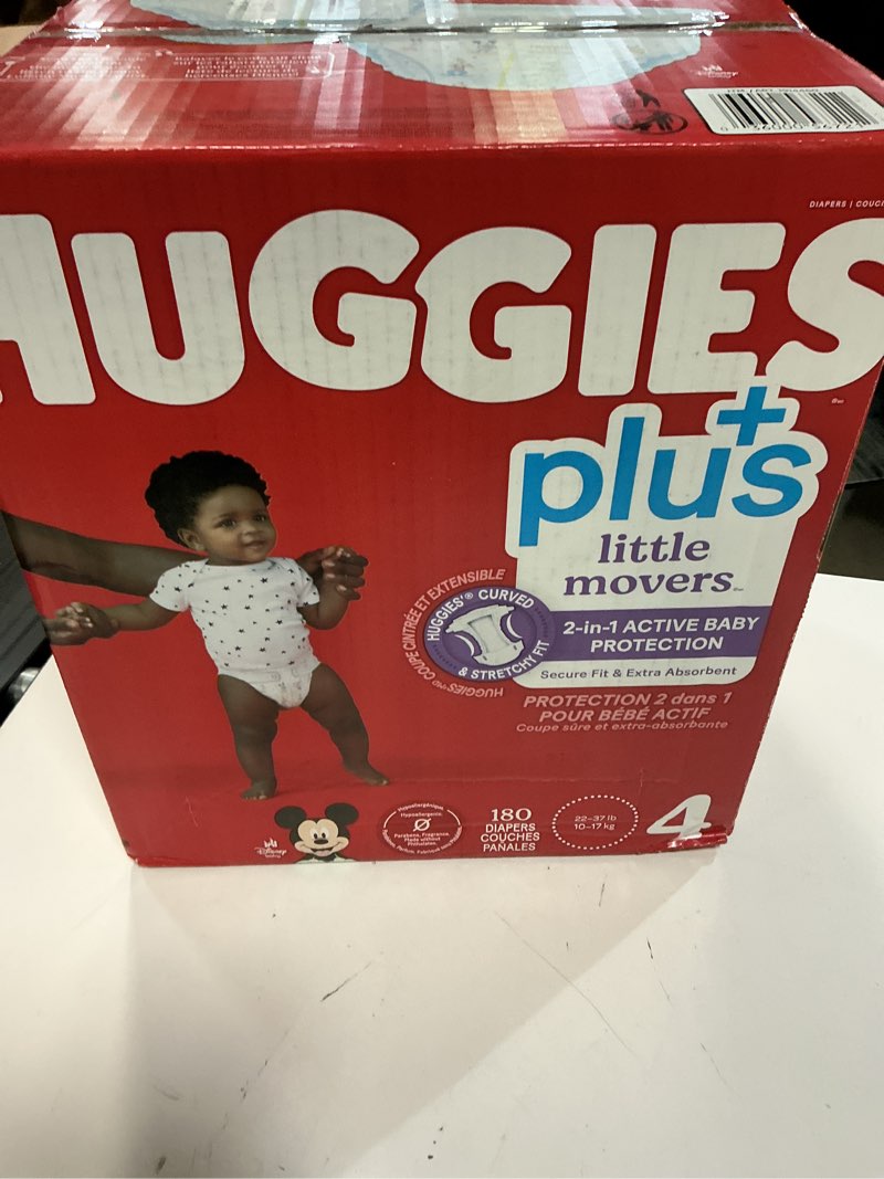 Condition photo showing New/Like New for huggies, plus little movers diapers, disney baby, size 4