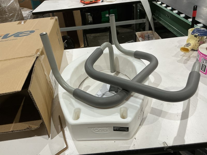 Condition photo showing Good Condition for carex 3.5 inch raised toilet seat with arms, elongated toilet seat riser, up to 250 lbs capacity, elevating & raising seat for elderly & handicap, universal, slip-resistant with padded handles, white