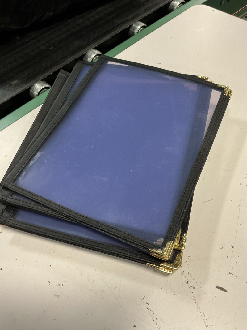 Condition photo showing As Is for 10 pack of menu covers - single page, 2 view, fits 8.5 x 11 inch paper - restaurant menu covers, transparent