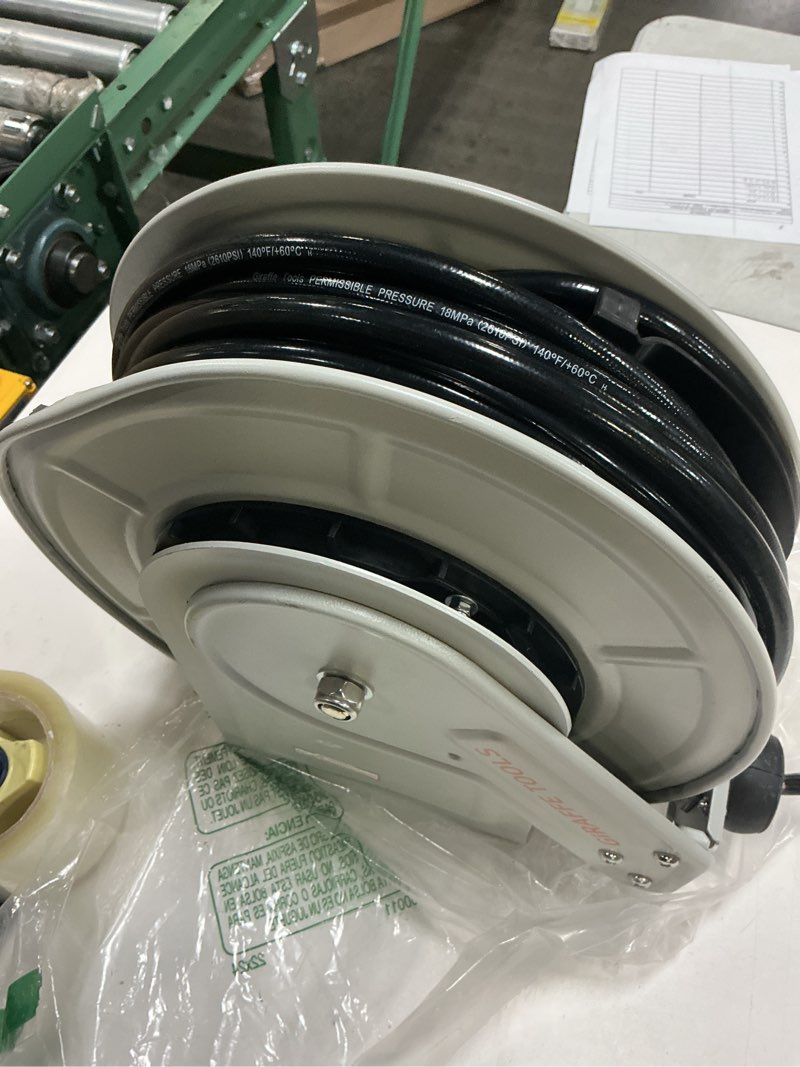 Condition photo showing As Is for giraffe tools pressure washer hose reel 65ft, 3200 psi power washer hose reel, pressure washer retractable hose reel, heavy duty, wall/floor mounted, silver