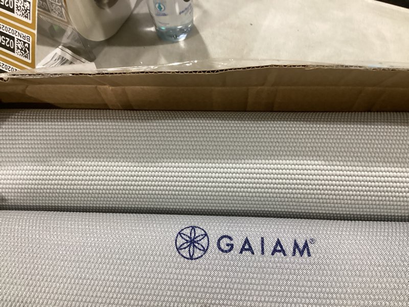Condition photo showing As Is for gaiam yoga mat, pilates & exercise mat, thick 2/5" (10mm) workout mat with easy-cinch carrying strap for home & gym workouts grey 2/5" (10mm)