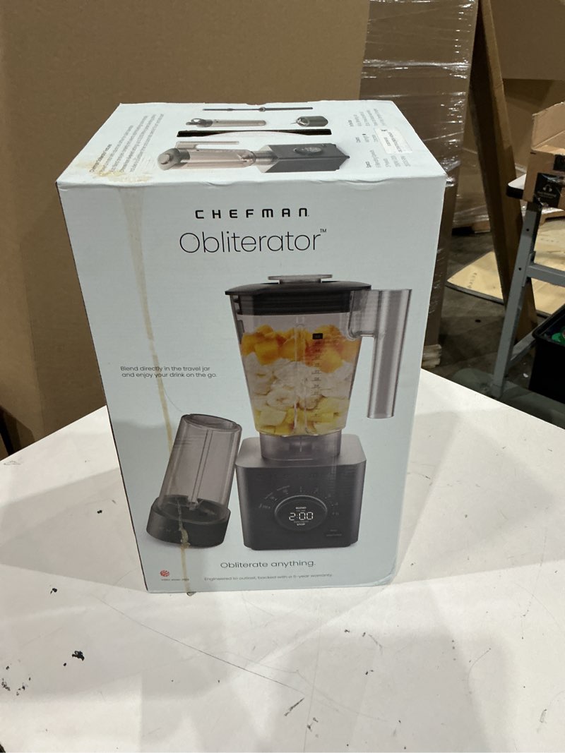 Condition photo showing New/Like New for chefman obliterator 48 oz countertop blender for smoothies, 1380w motor to crush ice, nuts, and frozen fruit with stainless steel blade, auto blend function, includes 20 oz travel jar