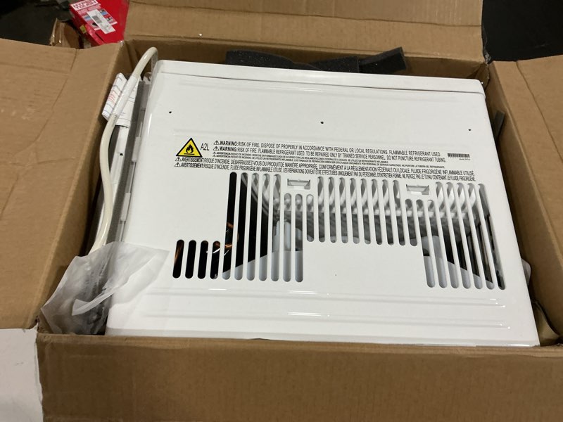 Condition photo showing As Is for 10,000 (doe) btu 115-volts window air conditioner cools 450 sq. ft. with wi-fi, remote and dehumidifier