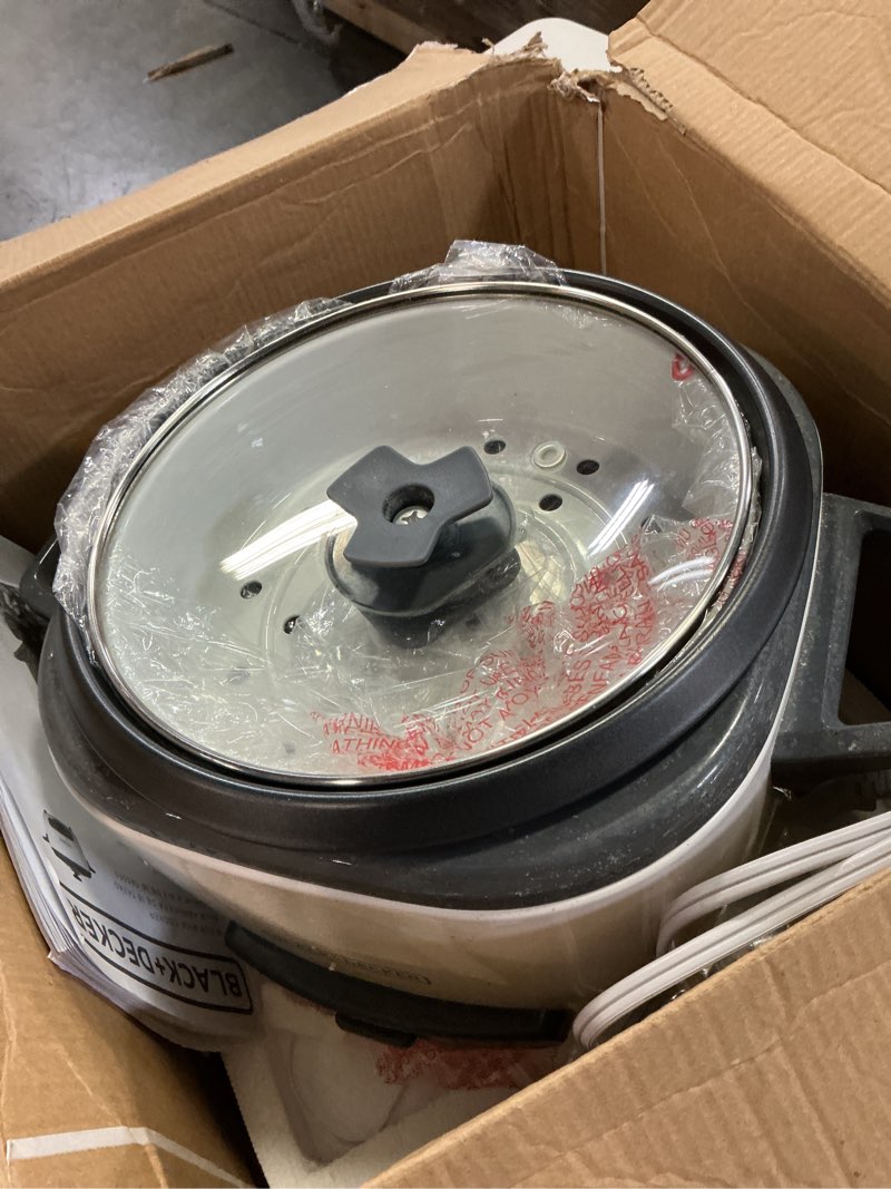 Condition photo showing As Is for BLACK+DECKER 16-Cup Rice Cooker, RC516, 8-Cup Uncooked Rice, Steaming Basket, Removable Non-Stick Bowl, One Touch