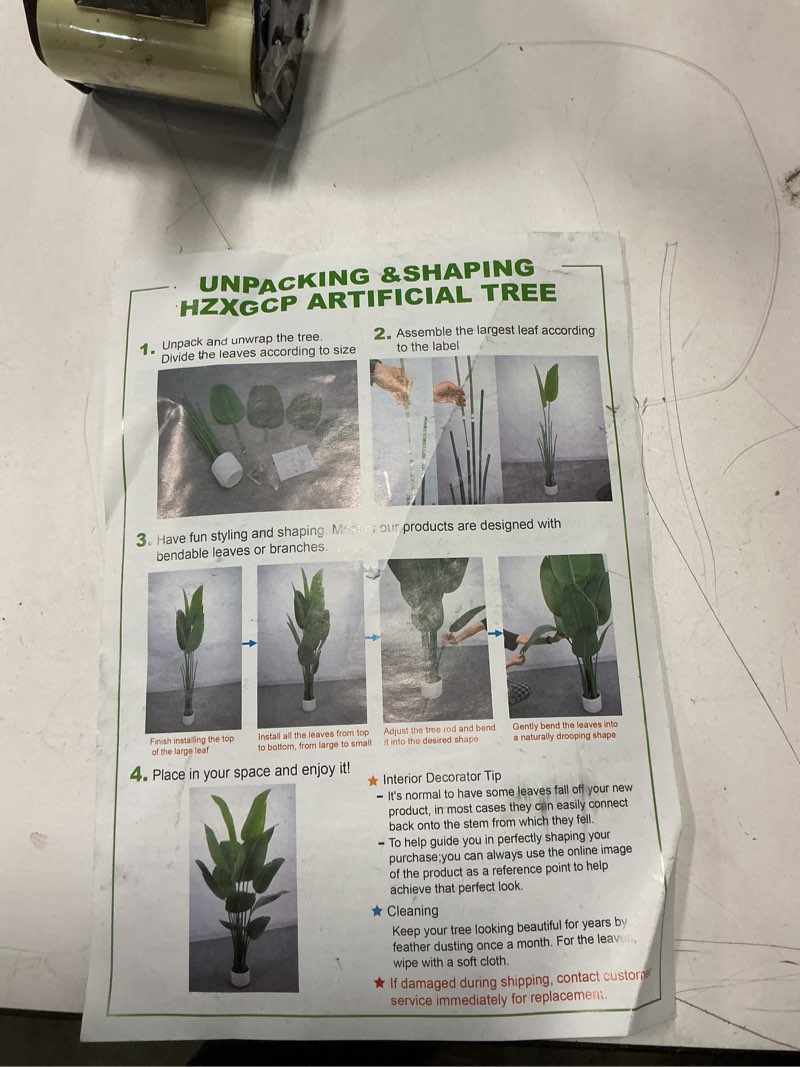 Condition photo showing Good Condition for Bird of Paradise Artificial Plant 4ft,Faux Plants Indoor Tall with 8 Trunks - The Perfect Indoor Silk Floor Plant for Home Decor in Living Room, Office, and Bedroom