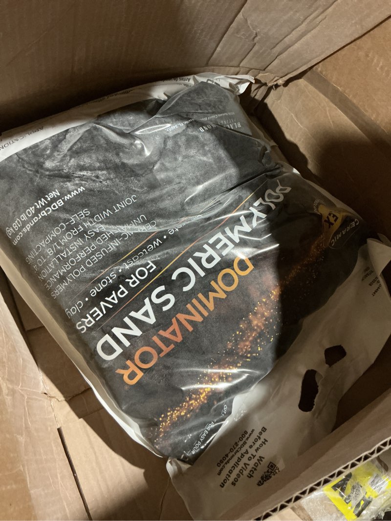 Condition photo showing As Is for dominator polymeric sand for pavers, titanium gray, 40 lbs - revolutionary ceramic flex technology for stabilizing paver joint widths 1/8” to 4” - professional grade paver sand for patio pavers 40 pound titanium gray