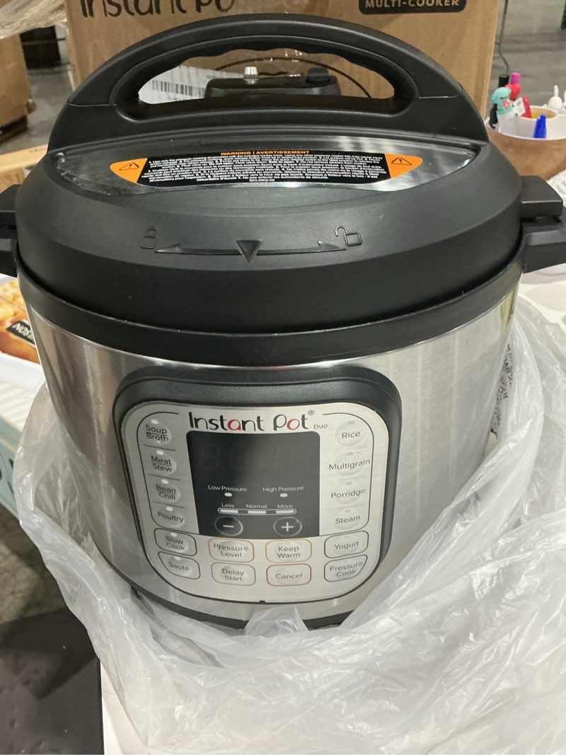 Condition photo showing As Is for instant pot duo 7-in-1 electric pressure cooker, slow cooker, rice, steamer, sauté, yogurt maker, warmer & sterilizer, includes app with over 800 recipes, stainless steel, 6 quart 6 quarts