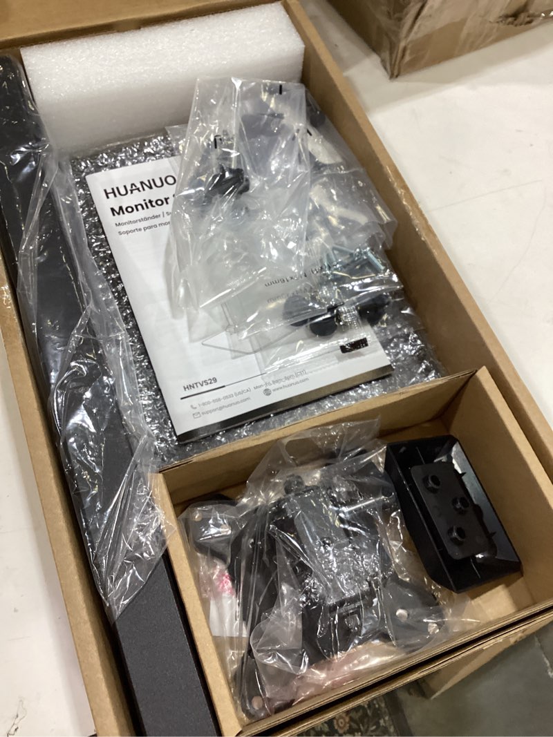 Condition photo showing Good Condition for huanuo monitor stand, freestanding vesa mount for 13 to 34 inch screens, holds up to 44lbs, 5 height options, swivel desk stand riser with 360 rotation, vesa 75x75mm/100x100mm