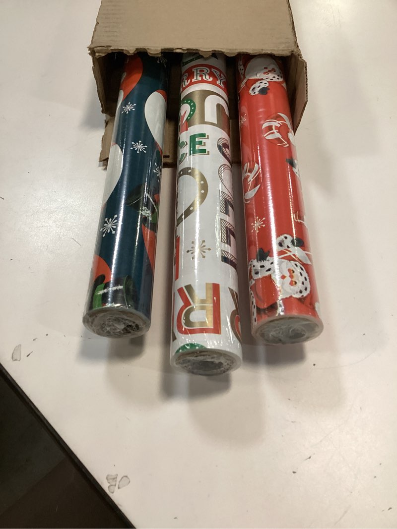 Condition photo showing Good Condition for Hallmark Vintage Christmas Wrapping Paper Cut Lines on Reverse (3 Rolls: 120 sq. ft. ttl) Dancing Santas, Classic Snowman, "Merry, Jolly, Happy, Peace"