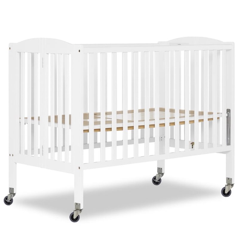 dream on me folding full size convenience crib in white, comes with heavy duty locking wheels