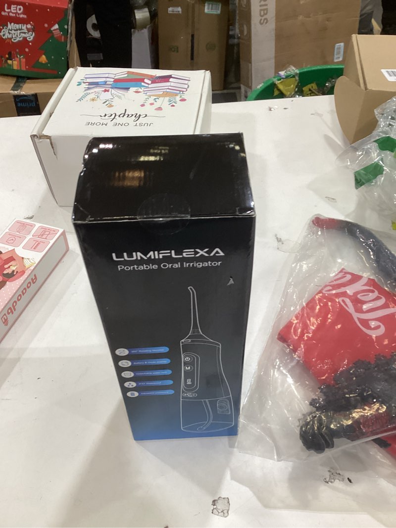 Condition photo showing New/Like New for Lumiflexa Water Dental Flosser for Teeth Pick, Cordless Flosser for Travel with 4 Jet Tips, 9 intensities, IPX7 Waterproof Portable & Rechargeable Oral Irrigator Cleaner, Black