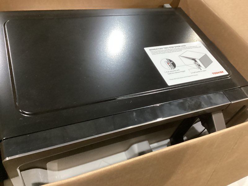 Condition photo showing Good Condition for toshiba ml-em09pa(bs) small microwave oven with 6 auto menus, mute function & child lock, led lighting, 0.9 cu ft, 10.6 inch removable turntable, 900w, countertop, black stainless steel advanced-0.9 cu ft-900w-black stainless steel