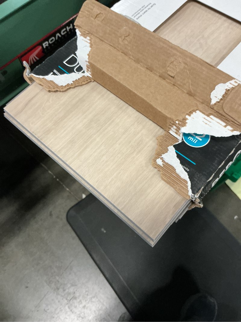 Condition photo showing Good Condition for pergo duracraft lavinia oak brown 22-mil x 9-1/2-in w x 47-in l waterproof interlocking luxury vinyl plank flooring (18.78-sq ft/ carton)