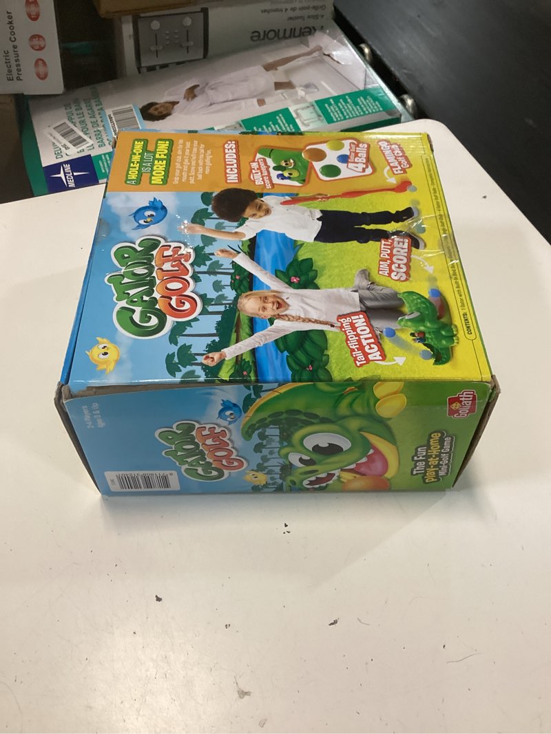 Condition photo showing New/Like New for gator golf - putt the ball into the gator's mouth to score game by goliath, single, gator golf, 27 x 27 x 12.5 cm for age 3+ years