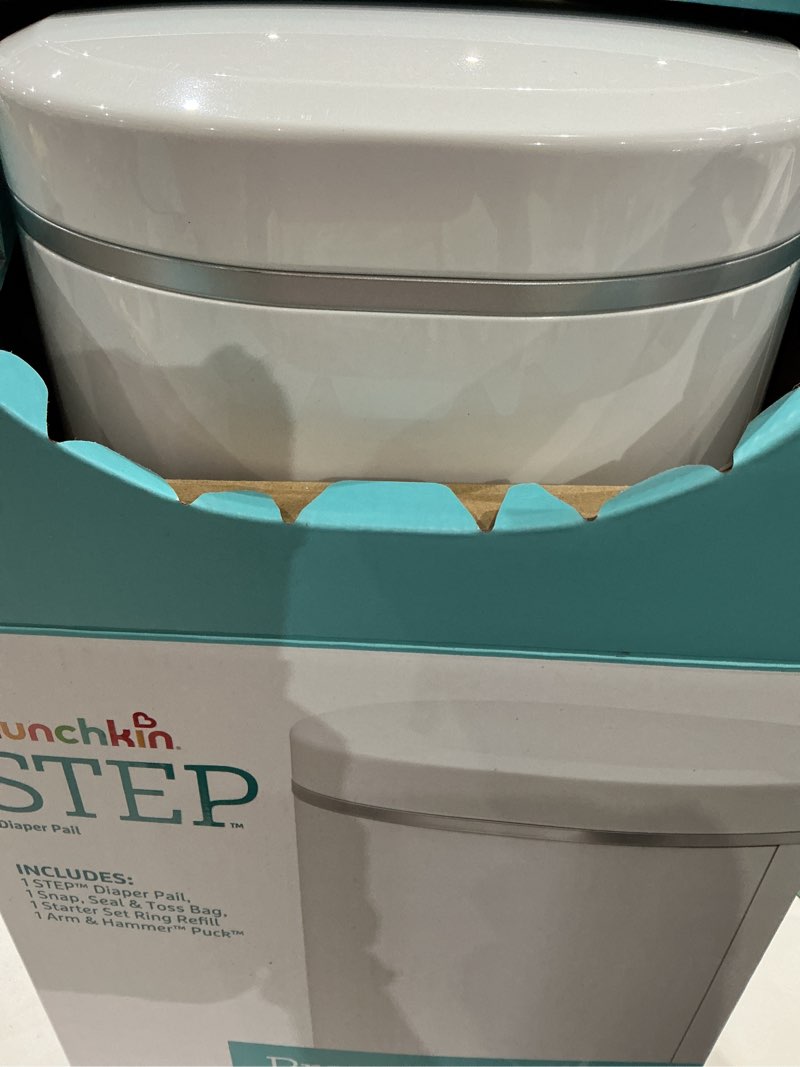 Condition photo showing Good Condition for munchkin® step™ diaper pail powered by arm & hammer, #1 in odor control, award-winning, includes 1 snap, seal & toss™ bag, 1 starter refill ring, and 1 puck™ baking soda cartridge