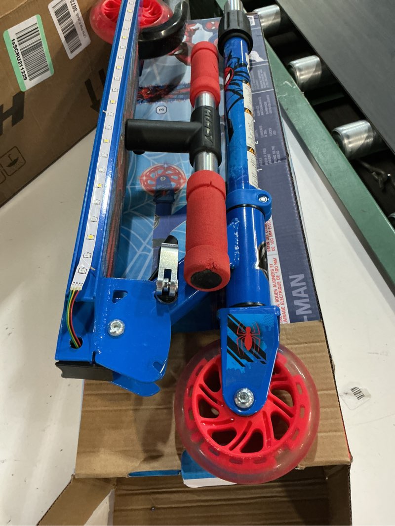 Condition photo showing Good Condition for huffy light up inline scooter for kids, 2 wheel kick scooter with led lights and rear brake, foldable, adjustable handlebar on select models, durable frame, licensed character graphics spider-man