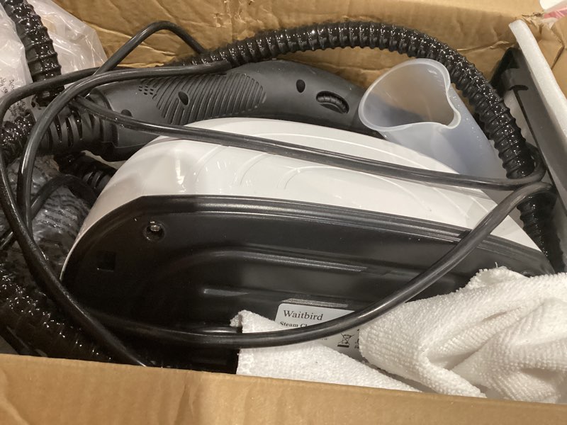 Condition photo showing Good Condition for steam cleaner with 21 specialized attachments, 1.08-liter water tank, 248°f high-temperature steam, suitable for floors, tiles, carpet, and kitchen surfaces, enables chemical-free cleaning