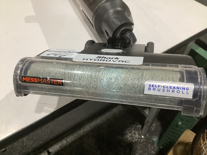 Condition photo showing As Is for (used, not tested)shark | wet dry vacuum cleaner | vacuum and mop combo | hydrovac messmaster | 3-in-1 self-cleaning + powerful suction | 2 brushrolls & 2 solutions included | hardwood floor & area rug cleaner | aw261 cordless w/ premium