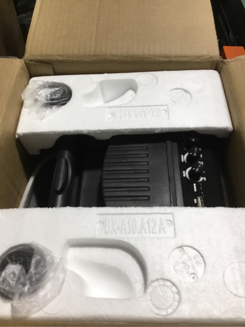 Condition photo showing Good Condition for Portable Bluetooth PA Speaker System - 600W 10” Outdoor BT Speaker - Includes 2 Wireless Microphones, Party Lights, USB SD Card Reader, FM Radio, Rolling Wheels - Remote Control - Pyle PPHP101WMB