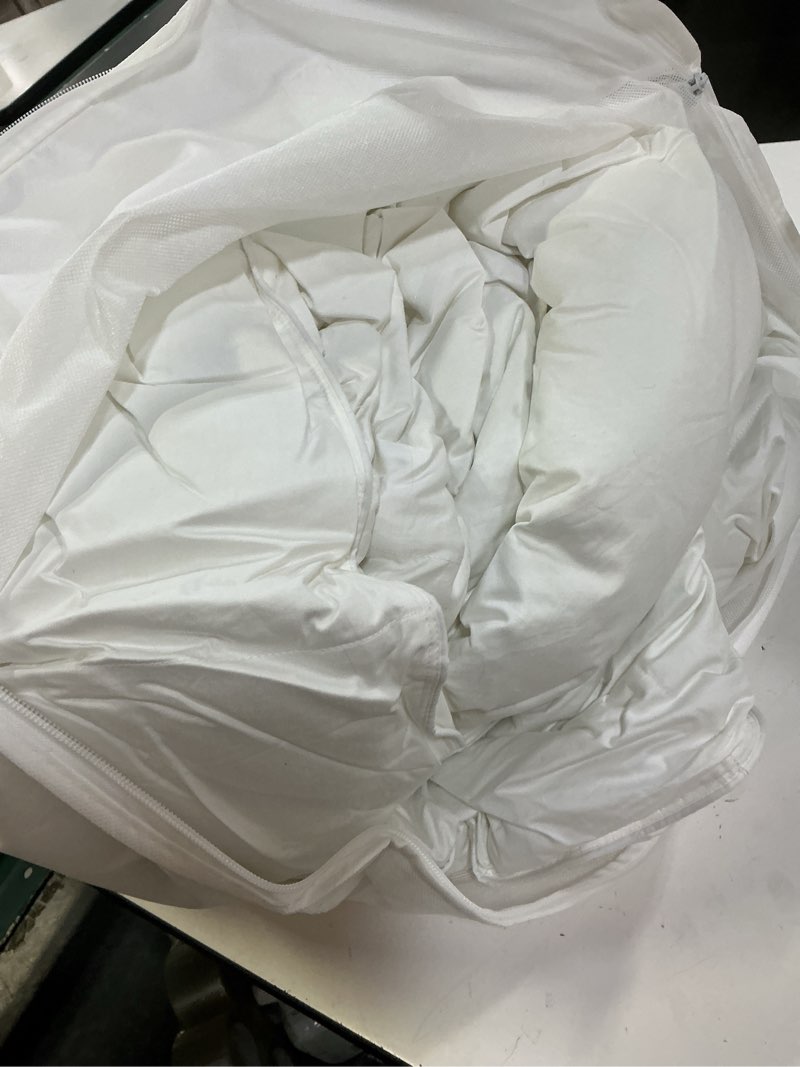 Condition photo showing As Is for all-season premium down alternative comforter, king/cal king, white