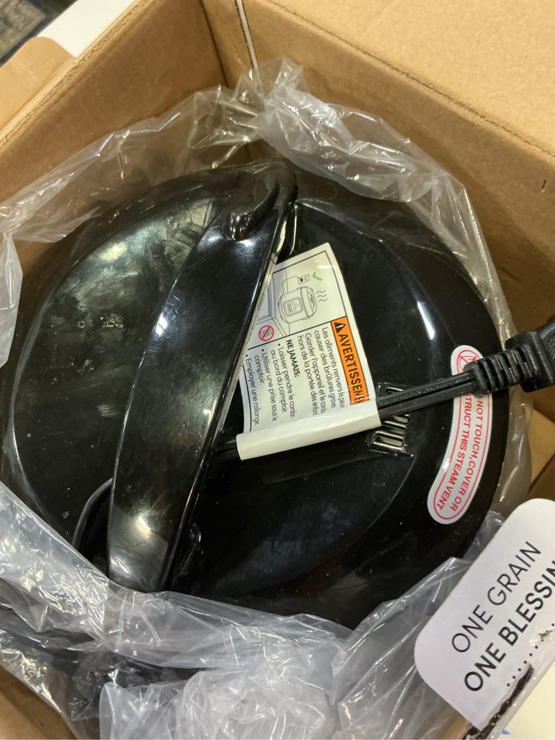 Condition photo showing item condition for AROMA Digital Rice Cooker, 4-Cup (Uncooked) / 8-Cup (Cooked), Steamer, Grain Cooker, Multicooker, 2 Qt, Stainless Steel Exterior, ARC-914SBD 4 Cup Uncooked / 8 Cup Cooked