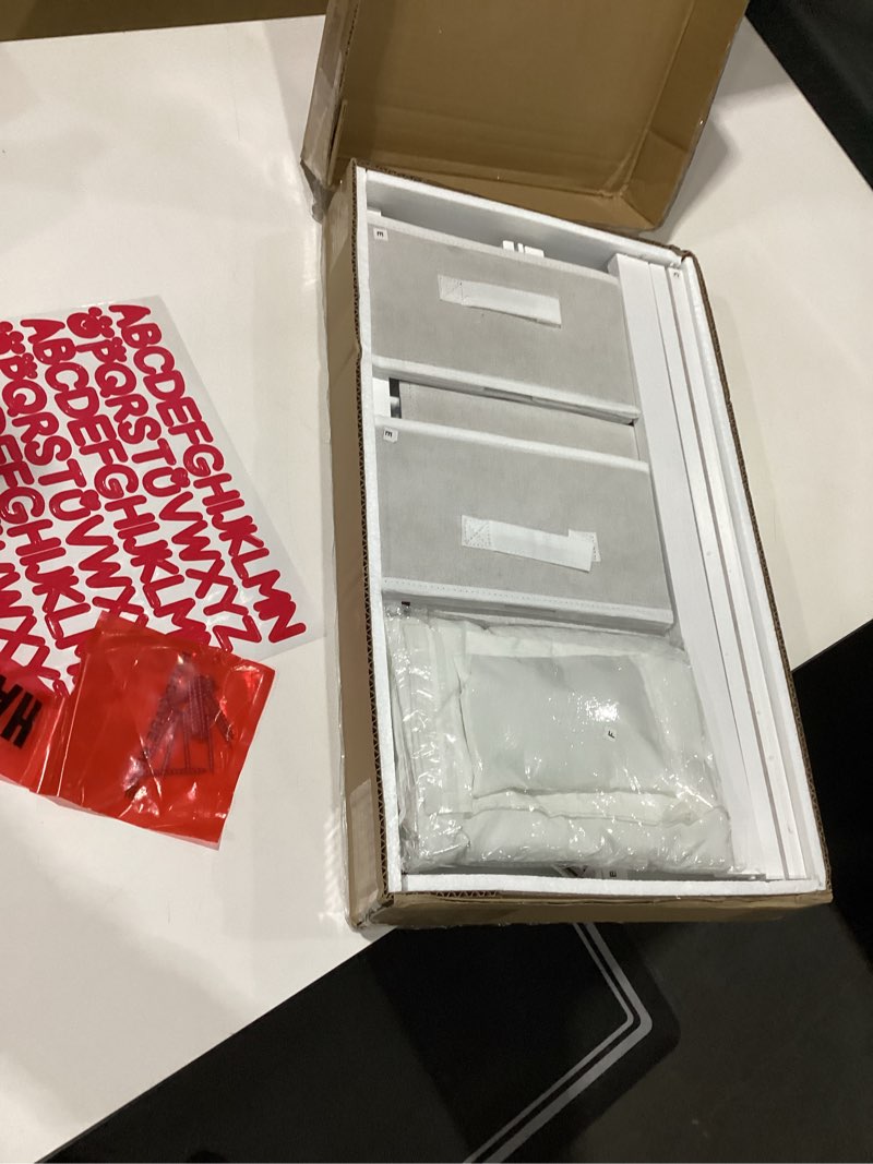 Condition photo showing New/Like New for Badger Basket Wooden Doll Bed with Bed Liner, Pillows and Two Storage Baskets - Fits 18" Dolls - Ideal for Pretend Play and Baby Doll Fun - White/Rose Design with Free Personalization Kit