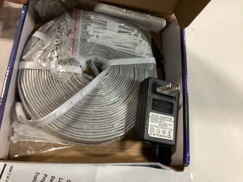 Condition photo showing As Is for 100ft outdoor led strip light waterproof,ip68 outside rgb+ic light strip with app/remote control,chase mode,music sync rope light for balcony,deck,rooftop,garden,pool 100ft-ip68 led strip lights