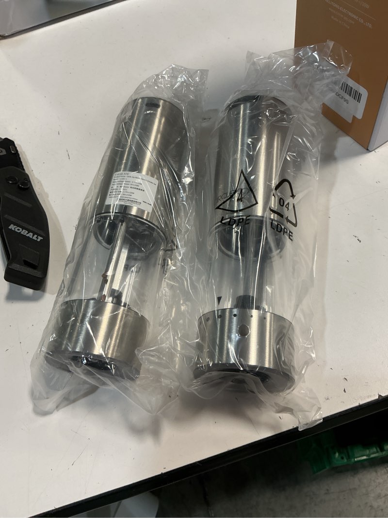 Condition photo showing As Is for circle joy rechargeable electric salt and pepper grinder set with base, stainless steel pepper mills with 95ml container, white led light and external adjustable coarseness, silver rechargeable set with base