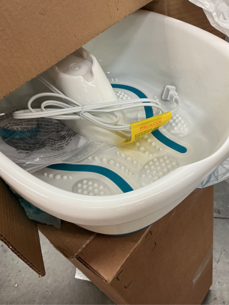 Condition photo showing As Is for homedics bubble mate foot spa, toe touch controlled foot bath with invigorating bubbles and splash proof, raised massage nodes and removable pumice stone