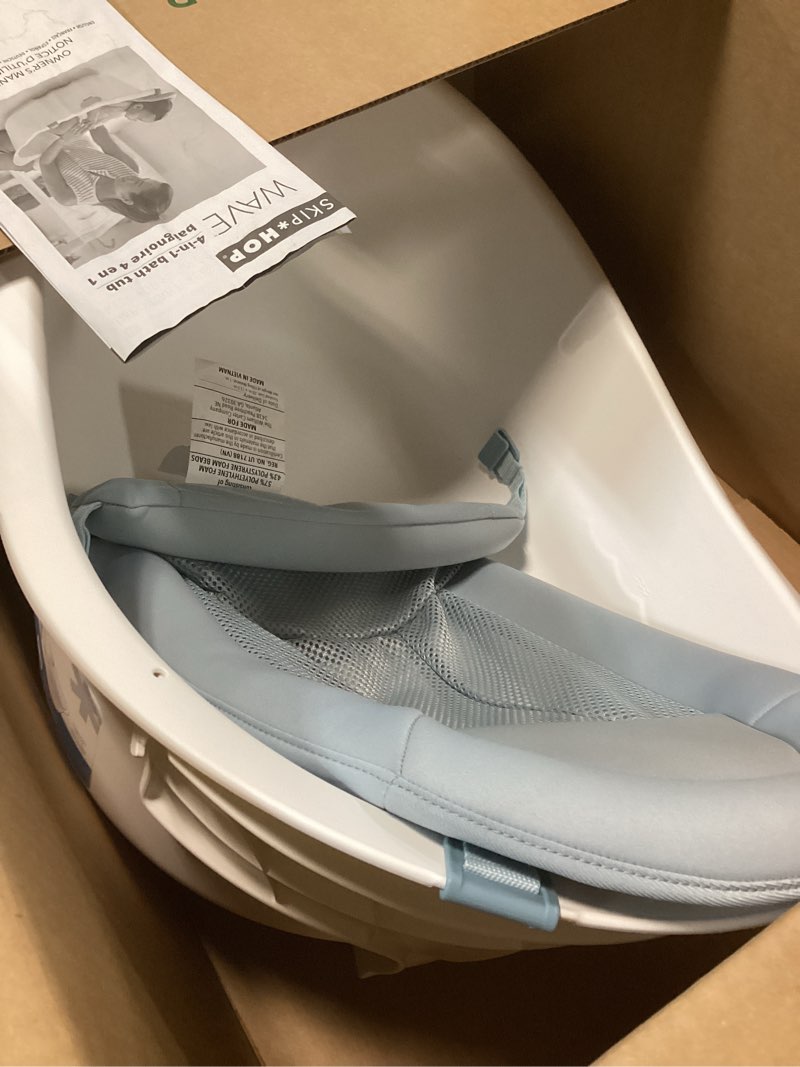 Condition photo showing Good Condition for skip hop baby bath tub 4-in-1 grow with baby infant to toddler bathtub with supportive sling and sit-up support wave age 0m+ wave tub