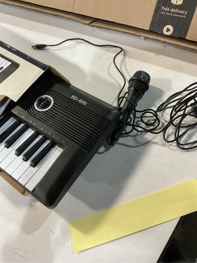 Condition photo showing As Is for 61 keys keyboard piano, electronic digital piano with built-in speaker microphone, portable keyboard gift teaching for beginners, electric piano for kids black