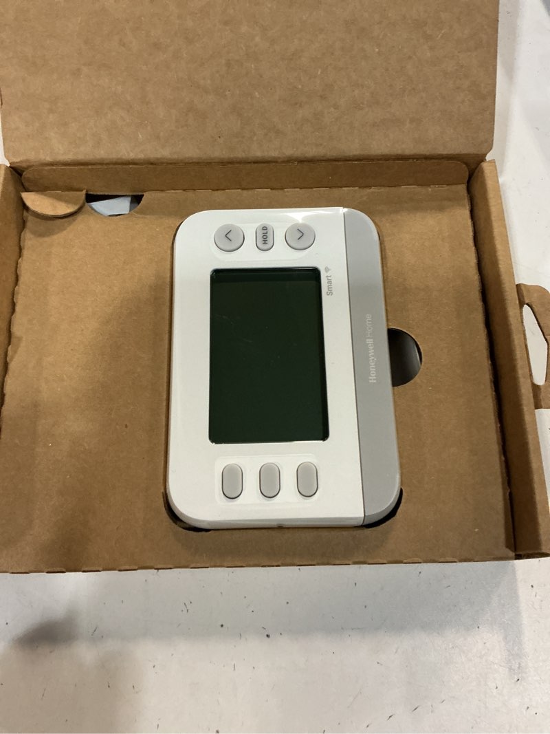 Condition photo showing As Is for honeywell home x2s smart built in wifi heating and cooling push button smart-enabled programmable th