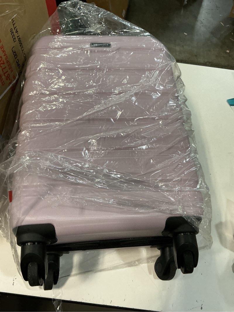 Condition photo showing As Is for Wrangler 22" Hardside Spinner Carry-On Luggage, Lilac