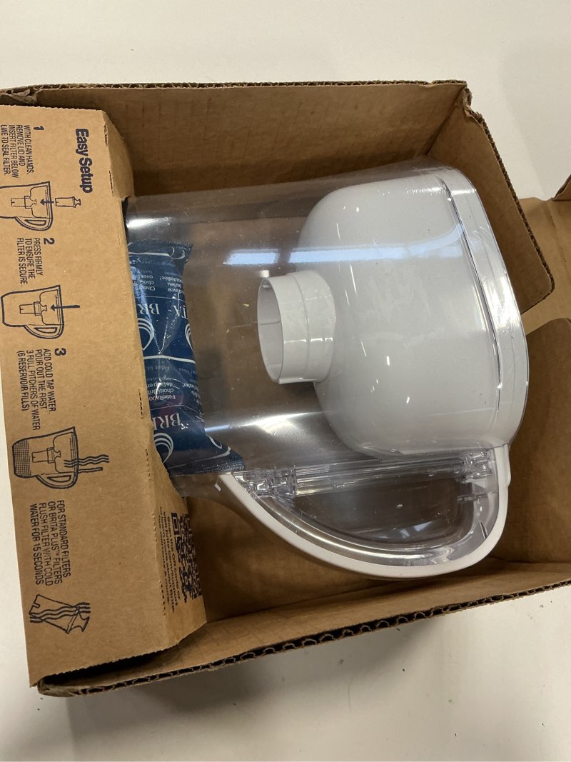 Condition photo showing As Is for Brita Water Pitcher, Metro Elite Filter, Removes 99% of Lead, Includes 1 Filter, 6-Cup Capacity, White Elite White