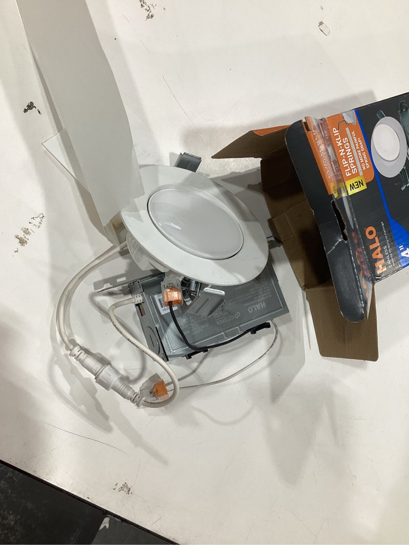 Condition photo showing As Is for hla 4” canless led recessed lighting with super adjustable gimbal, cct select, dimming, 600 lumens - round