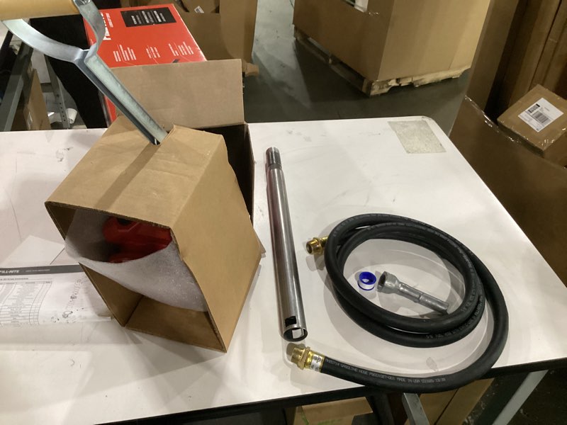Condition photo showing New/Like New for not tested**** fill-rite fr152 piston hand pump with hose & nozzle spout, red piston pump w/accessories