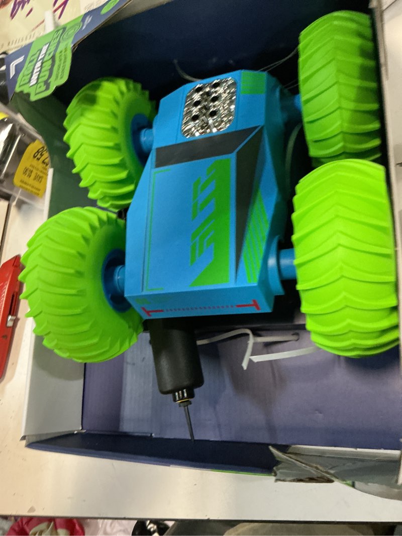 Condition photo showing Good Condition for sharper image® bounce blitz remote control stunt car, green, ages 6+