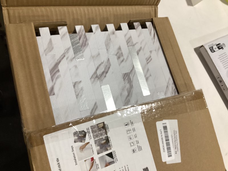 Condition photo showing Good Condition for YMMXGE 10-Sheet Peel and Stick Backsplash Stone Marble Tiles, PVC Metal Wall Sticker for Kitchen 9.74 sq .ft (10, White Stone) 10 White Stone