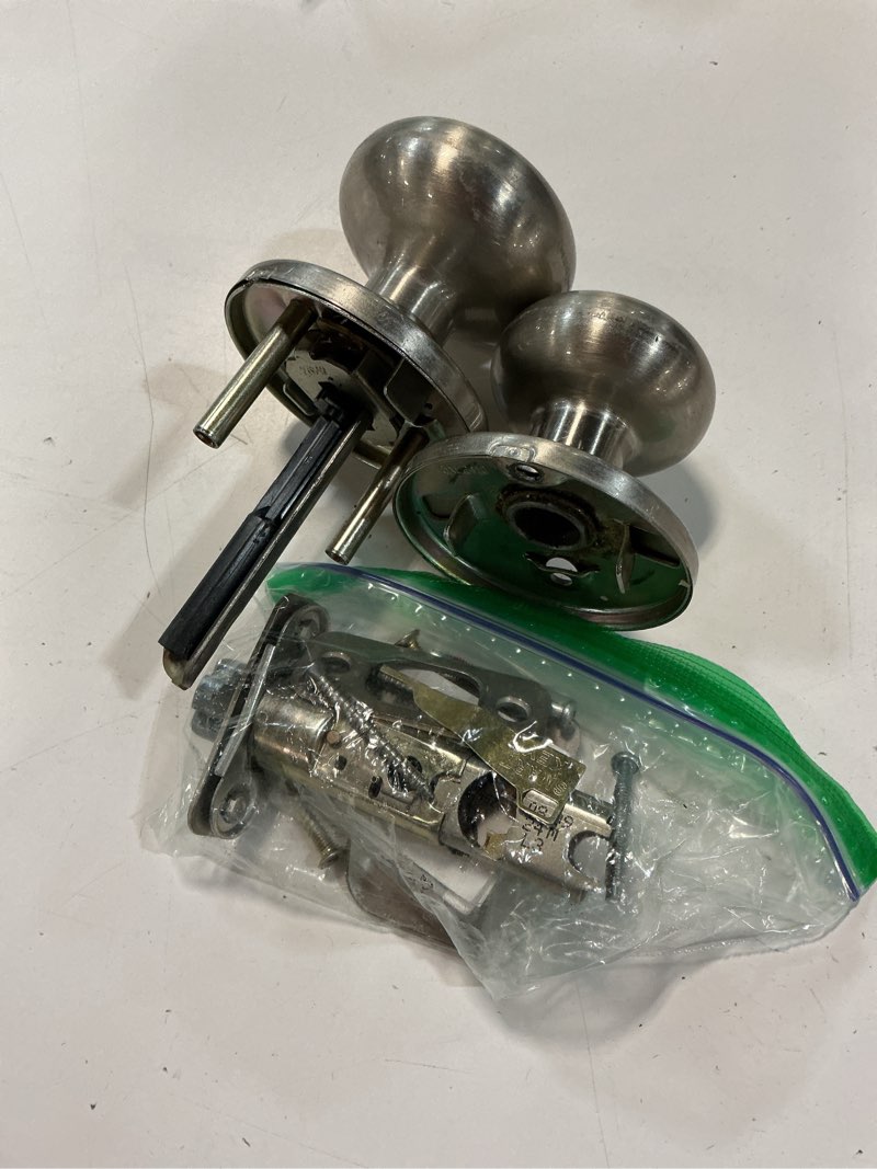 Condition photo showing As Is for kwikset hancock entry door knob with lock and key, secure keyed handle exterior, front entrance and bedroom, satin nickel, pick resistant smartkey rekey security and microban keyed entry satin nickel