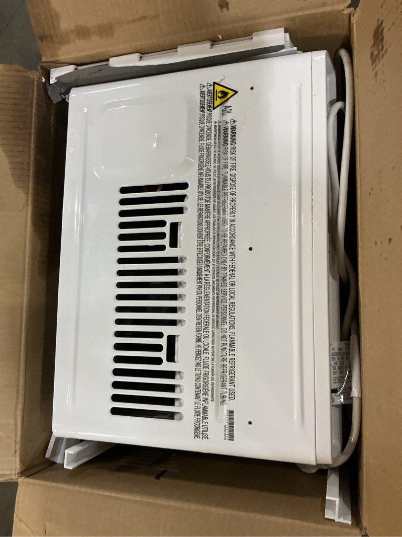 Condition photo showing As Is for lg 5000 btu window air conditioner with remote, easy button control ultra-quiet compact-size cools 150 sq.ft. for small room, washable filter ac unit easy installation white lw5025r