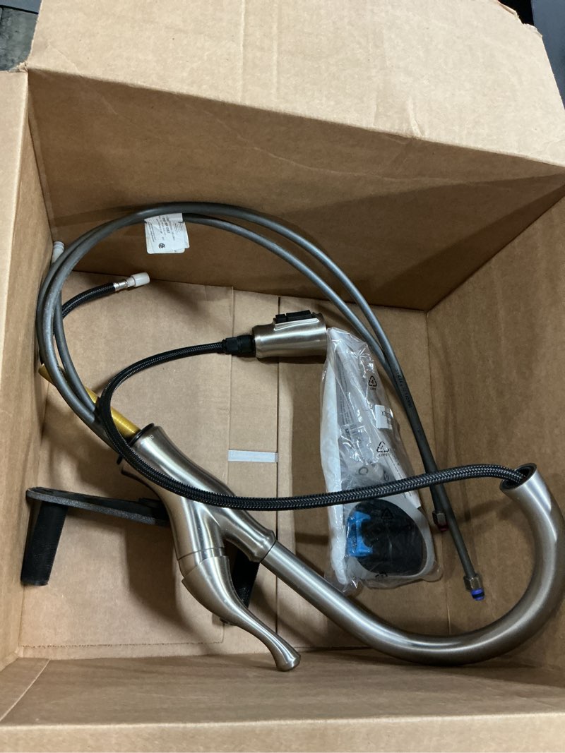 Condition photo showing As Is for Delta Ophelia Brushed Nickel Kitchen Faucet with Pull Down Sprayer, Modern Single Hole Kitchen Sink Faucet, Single Handle, SpotShield Stainless 19888Z-SP-DST