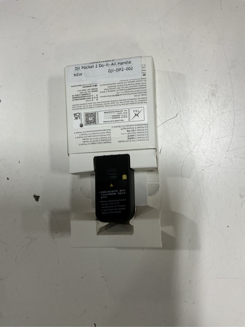Condition photo showing As Is for dji pocket 2 do-it-all handle